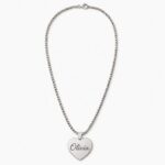 Personalized stainless steel heart necklace engraved with the name Olivia