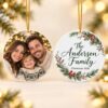 Double-sided acrylic Christmas ornament with a family photo on one side and a family name on the other